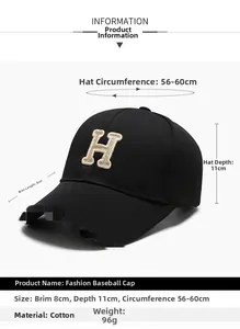 Close-up of black cotton baseball cap featuring a 3D gold embroidered letter H on front