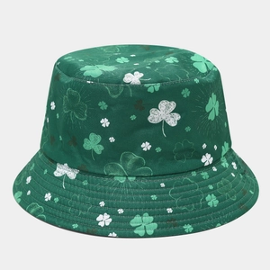 Detailed close-up of green St. Patrick's Day bucket hat with clover pattern print