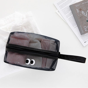 Cute black mesh storage bag with cartoon eyes embroidery and portable hand strap