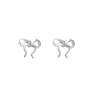 Elegant S999 sterling silver bow knot stud earrings for women on a clean white background