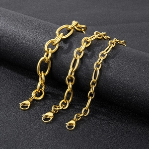 Three gold-plated stainless steel link chains with lobster clasps on a black background