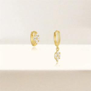 Detailed view of gold S925 silver hoop earrings with marquise-cut white zircon petals
