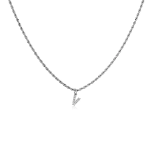 Detail of silver twisted rope chain with a crystal-encrusted letter V pendant close-up