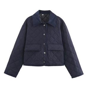Navy blue quilted nylon jacket with corduroy lapel collar and metal button closures