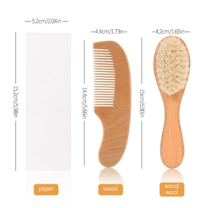 Detail view of beech wood baby brush set with soft wool bristles and size dimensions