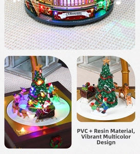 Detail of Christmas music box featuring rotating Santa sleigh, reindeer and LED lights