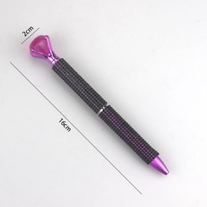 Detailed view of a purple rhinestone pen with a large pink crystal top, 16cm long