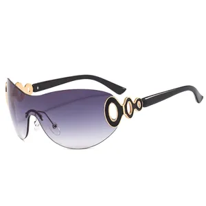 Y2K rimless oversized sunglasses with purple gradient lenses and gold metal ring detail