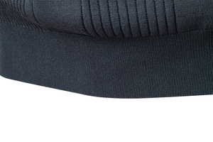 Detail of high-quality dark grey ribbed knit texture and premium stitching on polo sweater