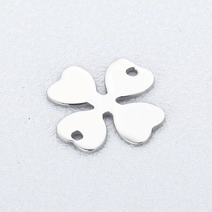 Polished silver heart-shaped four-leaf clover pendant with double connector holes