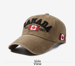 Detail of khaki cotton baseball cap showing black Canada embroidery and national flag