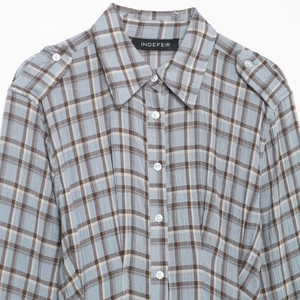Women's blue and brown checkered shirt dress with shoulder straps and button detail