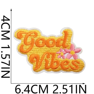 Detailed view of Good Vibes butterfly patch with dimensions 4cm x 6.4cm and pink floral design