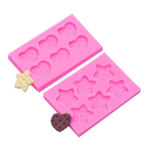 Pink silicone mold set featuring 6-cavity heart and star shapes for DIY baking decor