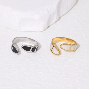Minimalist geometric enamel open rings in gold and silver finish on white stone