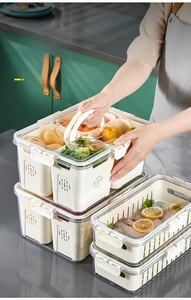 Stackable clear storage box with white drain basket and handle for kitchen fridge