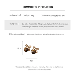 Detailed size and material chart for X-shaped tiger eye earrings in copper with 18k gold