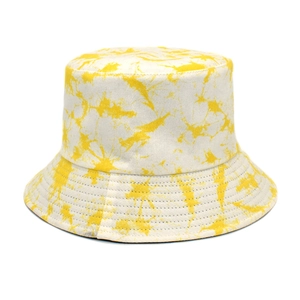 Detail of yellow and white tie-dye bucket hat showing stitching on the cotton brim