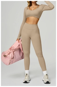 Detail of high-elasticity fabric and texture on a khaki long sleeve yoga set