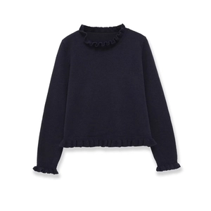 Detail of ruffle trim on neckline and cuffs of a dark blue ribbed knit sweater