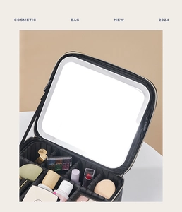 Detail of travel makeup bag with integrated LED mirror and adjustable dividers