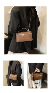 Detailed views of a brown lychee leather handbag with top handle and adjustable strap