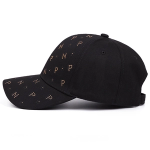 Classic black cotton baseball cap with gold rivet PN letter and star pattern detail