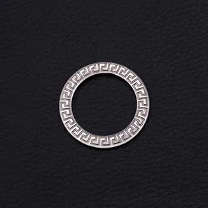 Titanium steel hollow circular pendant with Greek meander pattern in silver finish