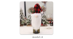 Detail of red plaid gnome wine bottle cover with white beard and festive berry decor