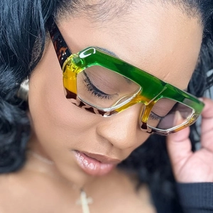 Fashionable thick frame sunglasses with green gradient top and leopard print finish