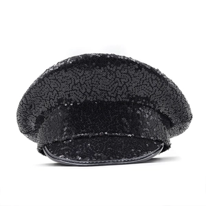 Close-up of black sequined flat top hat with a glossy brim for parties and stage performance