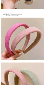 Detailed view of padded sponge headbands showing thick woven texture in vibrant colors