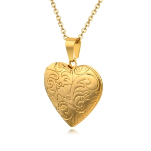 Elegant gold heart locket necklace with vintage floral engraving on a white background