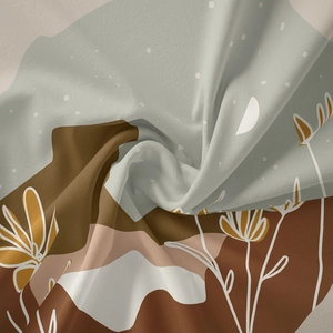 Detail of bohemian tapestry fabric showing soft texture and abstract floral print