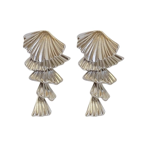 Modern silver shell-shaped layered stud earrings with a minimalist metallic finish