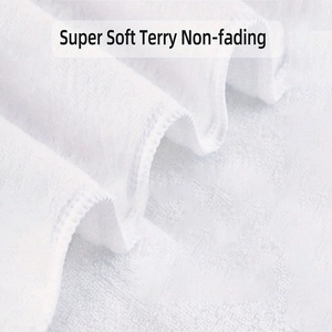 Close-up of super soft white terry kitchen towel showing plush non-fading fabric texture