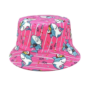 Detailed view of pink bucket hat featuring cute cartoon shark prints and fine stitching