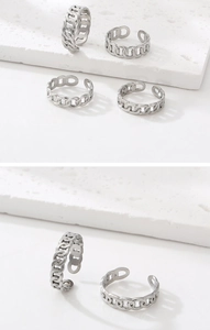 Detail of various adjustable silver chain link rings in polished stainless steel