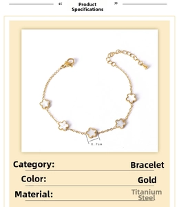 Detailed view of golden stainless steel bracelet featuring 0.7cm white shell flower charms