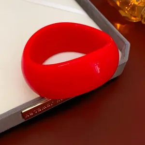 Minimalist wide wave irregular red resin bangle bracelet with glossy finish