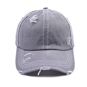Distressed grey washed cotton baseball cap with retro vintage style and torn details