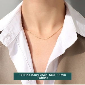 Close-up of 1.1mm golden titanium steel star chain worn on neck with professional attire
