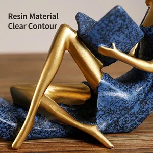 Minimalist Nordic resin reading girl statue with golden and blue artistic finish