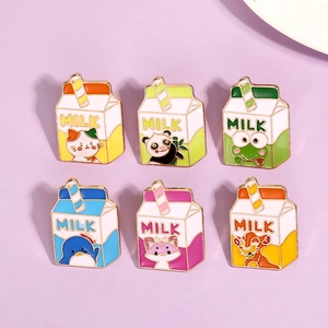 Set of six cartoon milk carton enamel pins featuring cute colorful animal designs