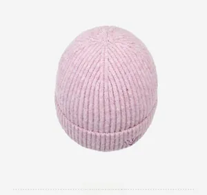 Detailed top view of purple knit beanie featuring rib-knit texture and W letter embroidery