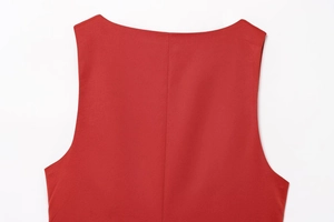 Detail view of red sleeveless top showing fabric texture and back vertical seam design