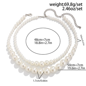 Detail of double layer faux pearl choker necklace with adjustable lobster clasp