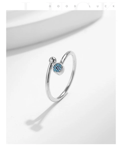 Macro shot of S925 sterling silver evil eye ring with turquoise and polished bead
