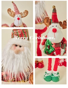 Close-up of sequin fabric and plush textures on Santa and Reindeer Christmas dolls