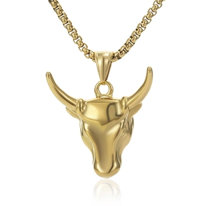 Polished golden bull head pendant necklace for men with box chain on white background